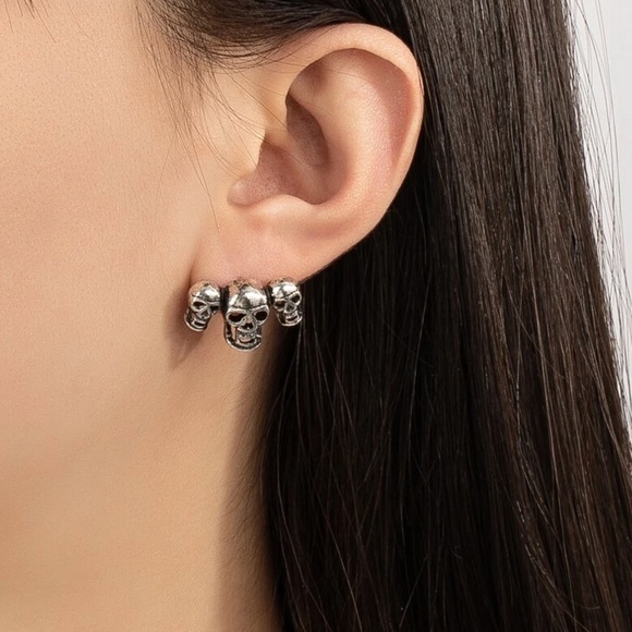Any 2/$20! Antiqued Silver Triple Skull Stud Earrings - Picture 2 of 6